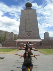 Llocasta "Jojo" Duran '20 poses with her friends at Mitad del Mundo ("Middle of the World").