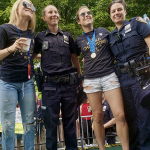 Blair poses with members of the US National Women's Soccer Team