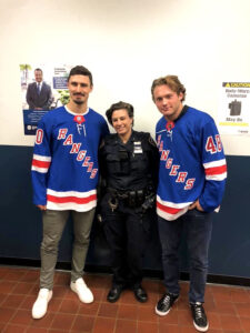 Blair poses with the Rangers. 