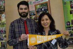 Todd and Dr. Cho representing the Mount at the NUS Formum