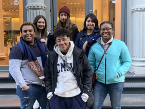 Roger Sanabria poses with Mount students.