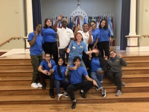 Roger Sanabria poses with Mount students.